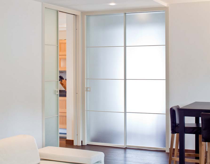 PORTE SCORREVOLI A SCOMPARSA IN ALLUMINIO/VETRO - TEMADOORS PORTE SCORREVOLI A SCOMPARSA IN ALLUMINIO/VETRO - TEMADOORS